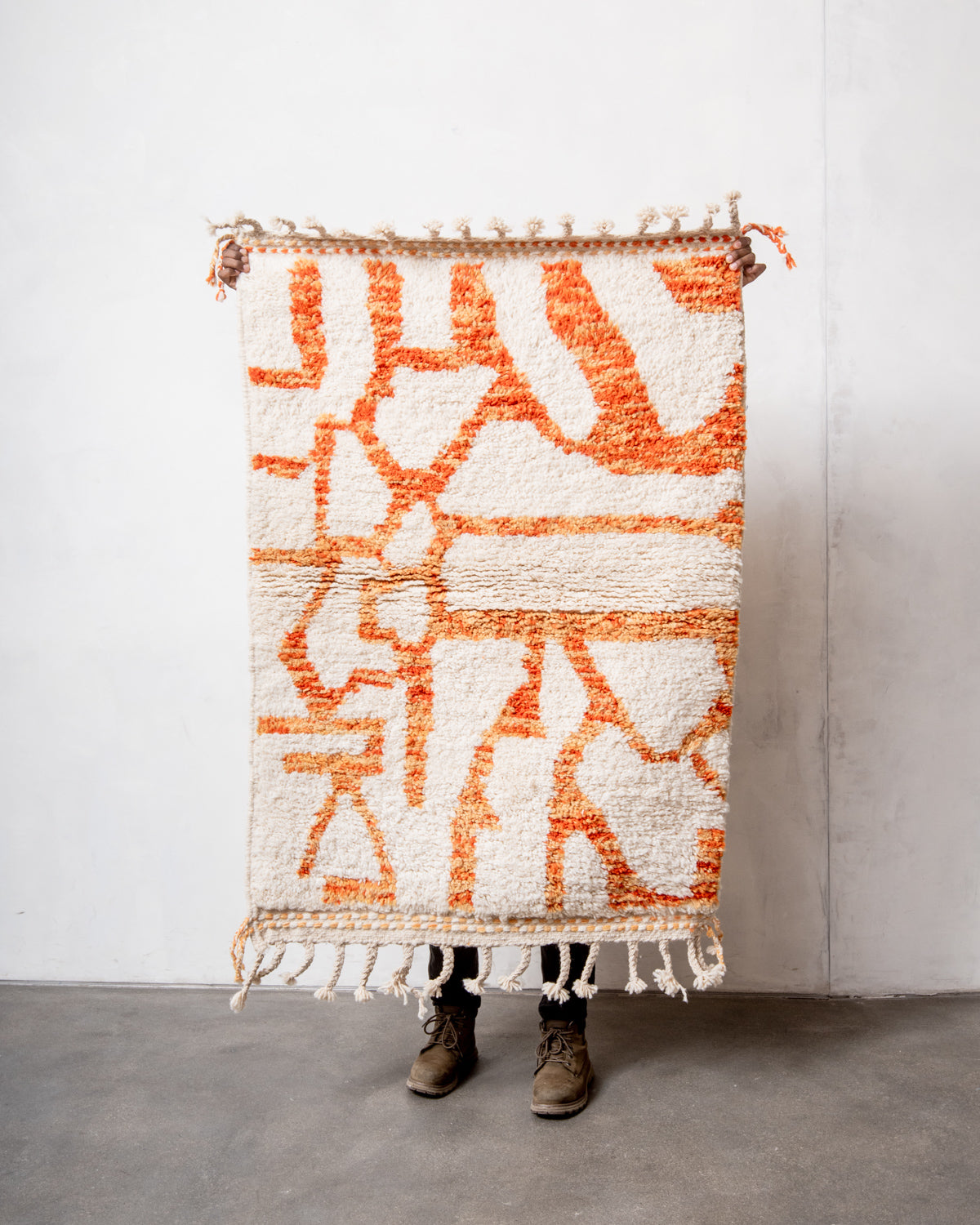 Modern, designer, handcrafted Berber rug from Morocco. Beniourain carpet with beautiful colours and patterns and fluffy wool texture.